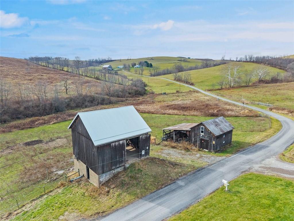 26 Covered Bridge Road Burgettstown, PA 15021 - Photo 24 of 49 an aerial view of a house with a yard