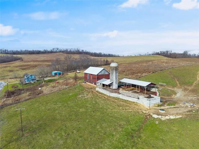 a view of a lake with houses in the back