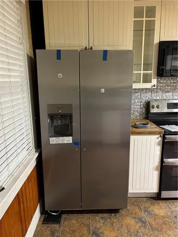 a view of a kitchen with a sink