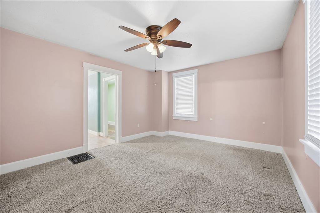 26 Covered Bridge Road Burgettstown, PA 15021 - Photo 9 of 49 an empty room with fan and windows