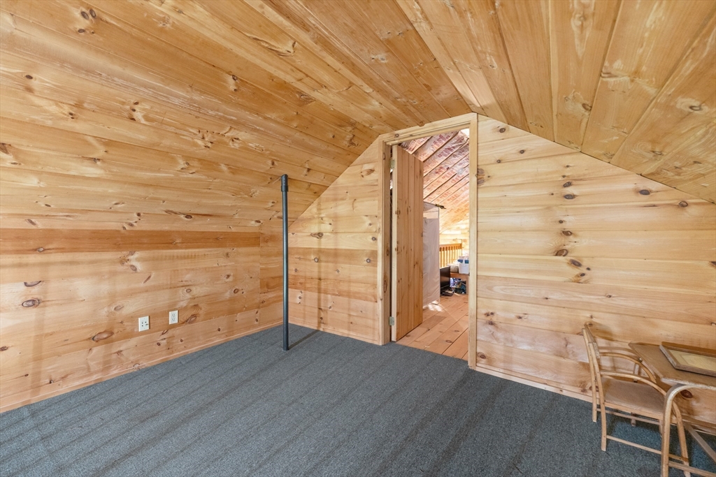 470 Mountain Road Wilbraham, MA 01095 - Photo 20 of 42 a view of a hallway with wooden floors and brick walls