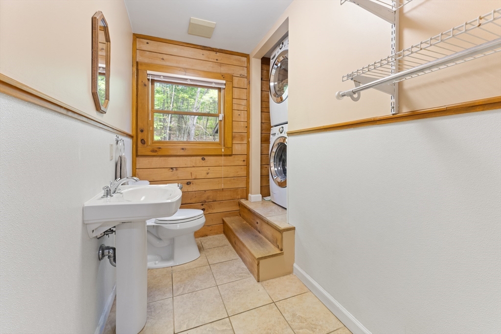 470 Mountain Road Wilbraham, MA 01095 - Photo 24 of 42 a bathroom with a sink a toilet and tub