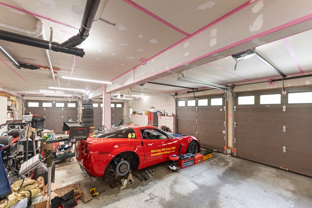 470 Mountain Road Wilbraham, MA 01095 - Photo 36 of 42 a car is parked in a garage