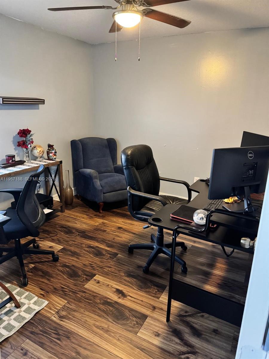 2931 Southeast 12th Road, Unit 10555 Homestead, FL 33035 - Photo 11 of 21 a view of workspace with wooden floor