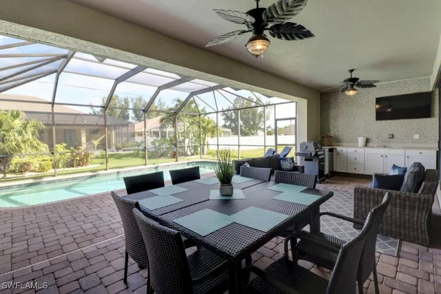 a view of a dining room with furniture window and outside view