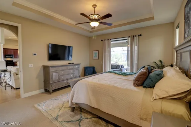 a bathroom with a tub a sink and a mirror
