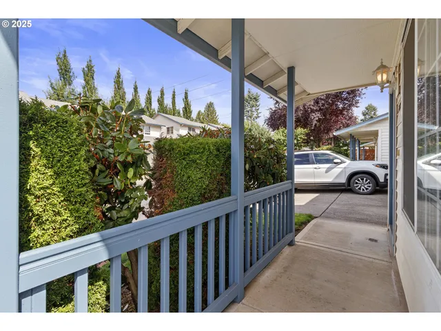 a view of a balcony with an outdoor space