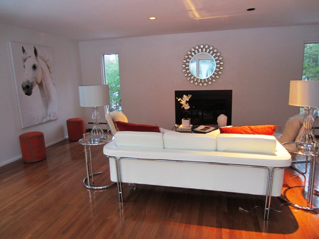 45 R Old Farm Road Darien, CT 06820 - Photo 5 of 16 a room with a table chairs and a lamp