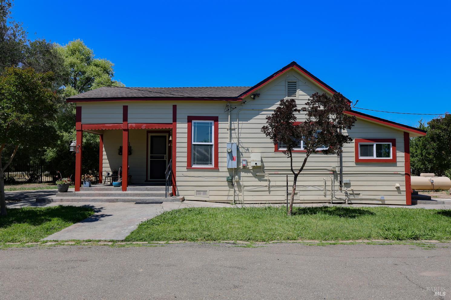 7948 North Meridian Road Dixon, CA 95620 - Photo 39 of 59 front view of a house with a yard