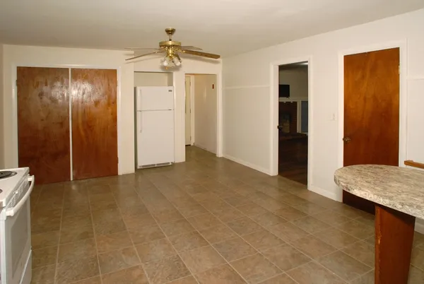 a view of a hallway with closet