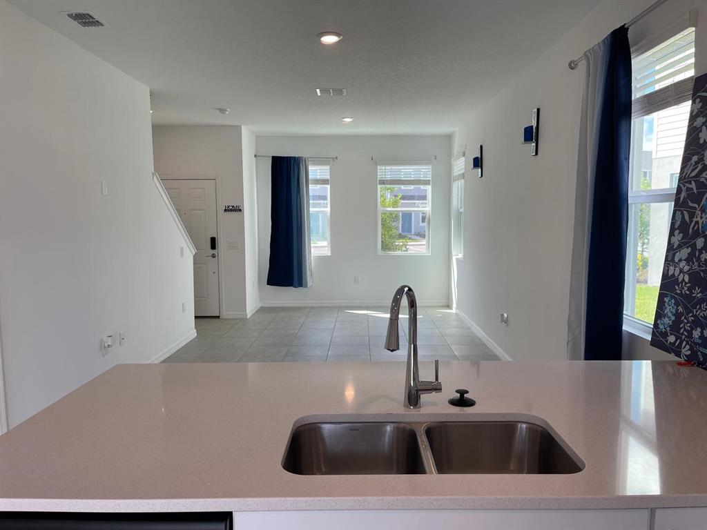 3335 Composition Street Kissimmee, FL 34758 - Photo 12 of 22 a kitchen with a sink and a window