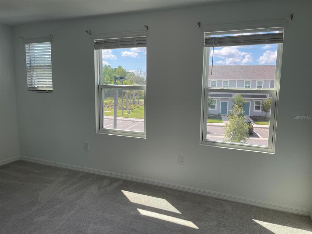 3335 Composition Street Kissimmee, FL 34758 - Photo 19 of 22 a view of an empty room with a window