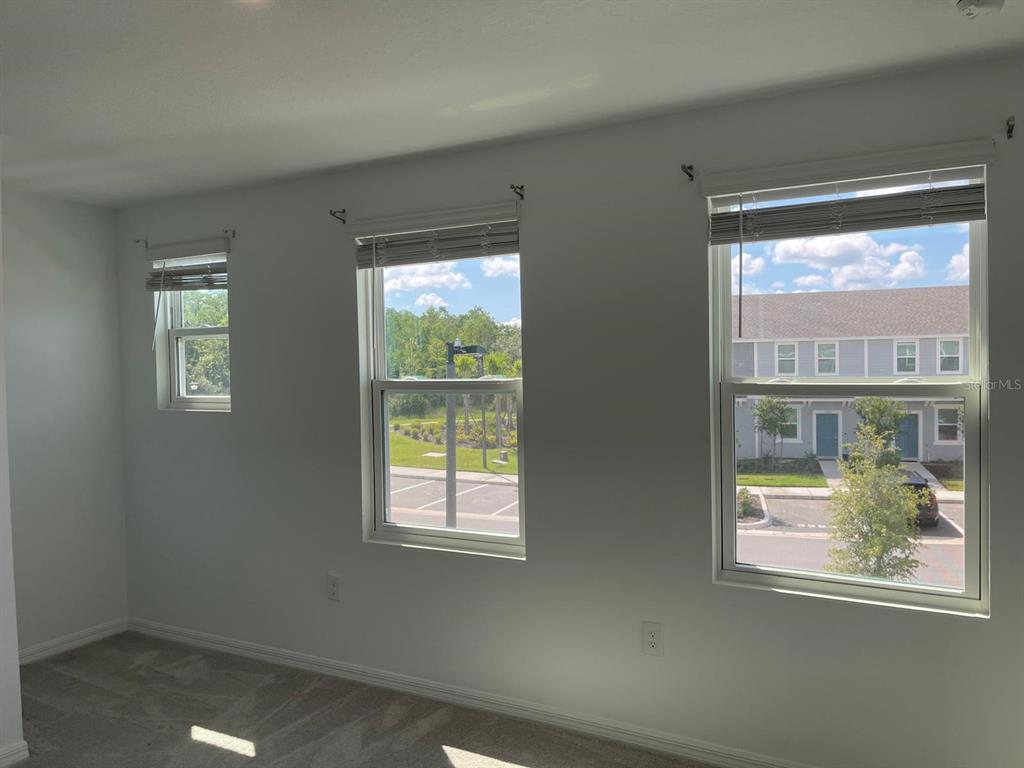 3335 Composition Street Kissimmee, FL 34758 - Photo 20 of 22 an empty room with windows