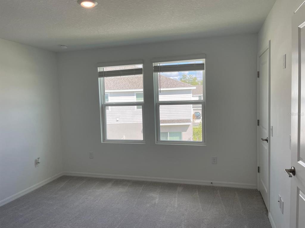 3335 Composition Street Kissimmee, FL 34758 - Photo 22 of 22 an empty room with a window