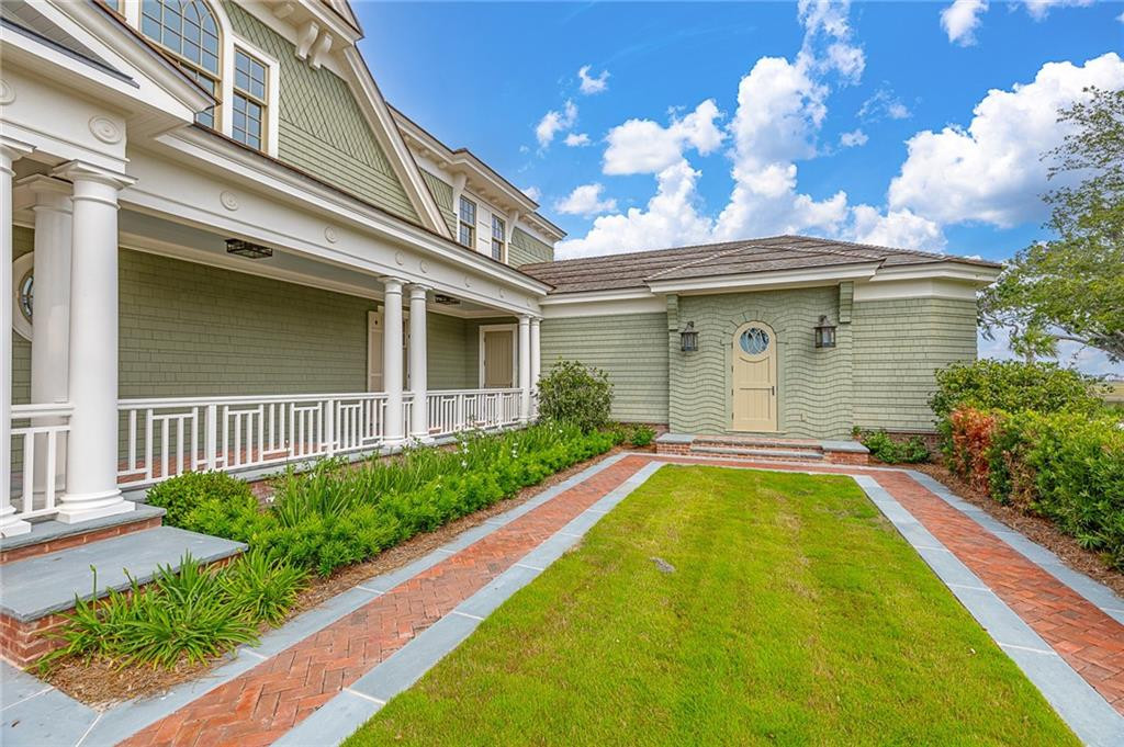 144 Point Lane St. Simons Island, GA 31522 - Photo 54 of 100 Exterior Entry - courtyard