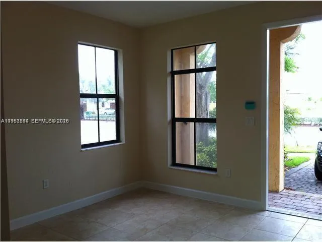an empty room with windows