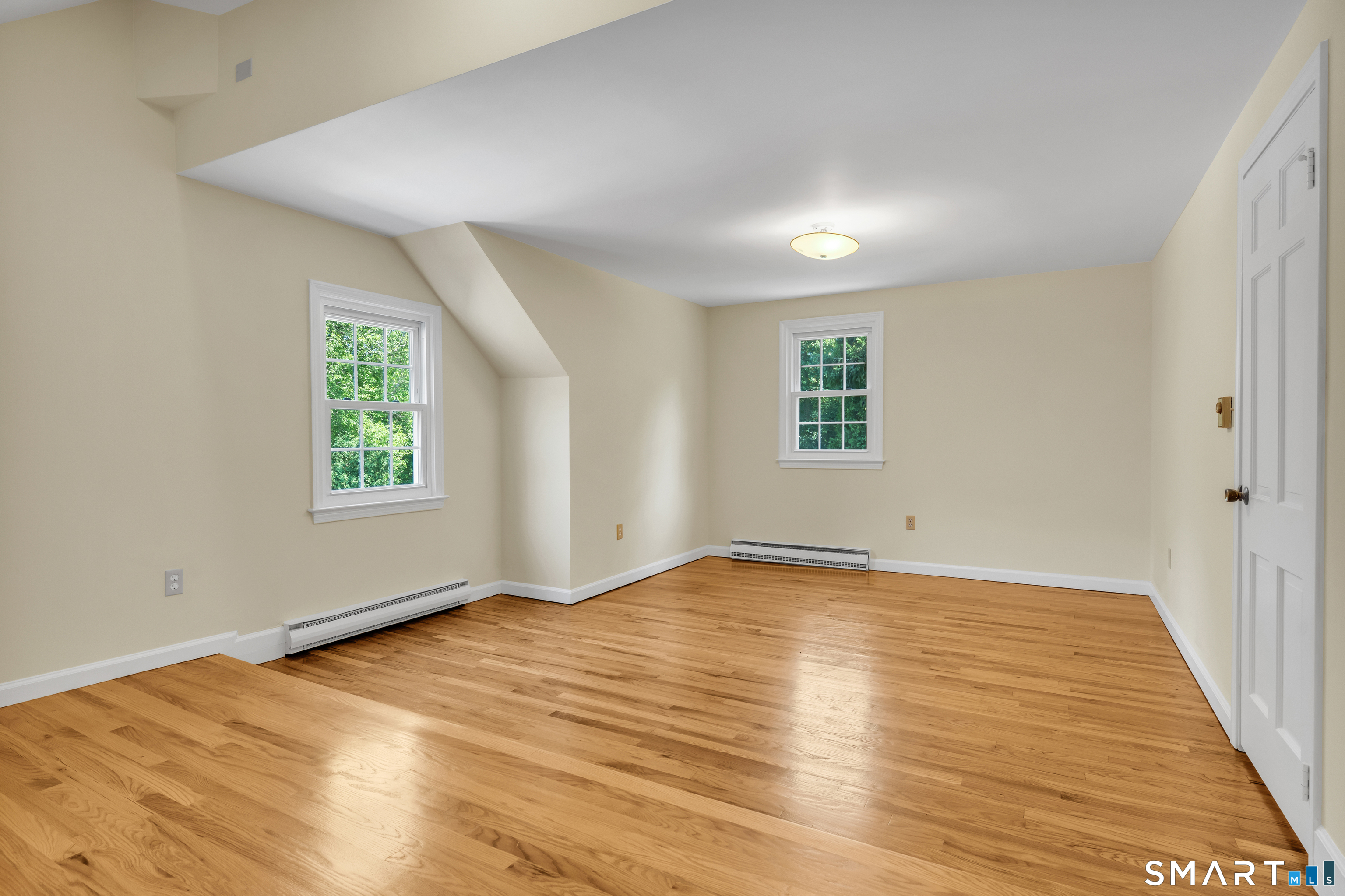 110 Nut Plains Road Guilford, CT 06437 - Photo 30 of 40 Room to spread out, floors that shine like new. Because they are.