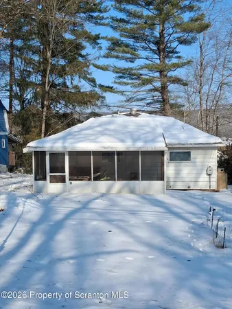 a front view of a house with yard