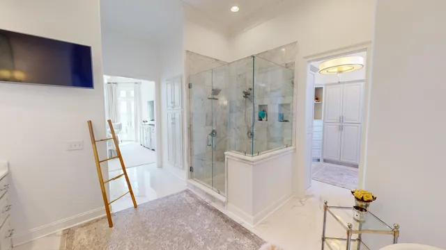 a bathroom with double vanity sink and a mirror