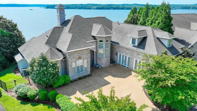a view of a house with outdoor space and sitting area