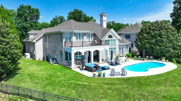 view of a house with a yard