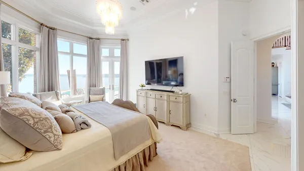 a kitchen with stainless steel appliances a sink a stove and a window