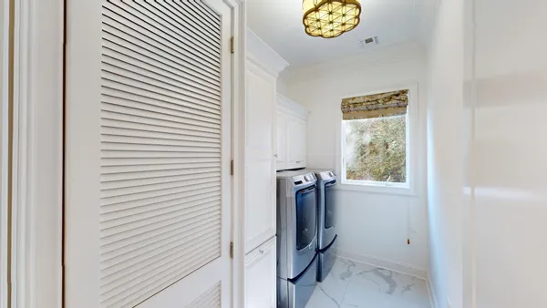 a view of walk in closet with window