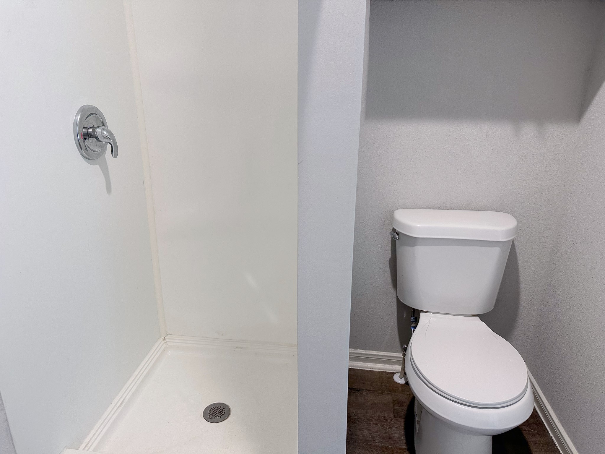 2704 Brewster Street Houston, TX 77026 - Photo 9 of 10 a bathroom with a toilet and a shower
