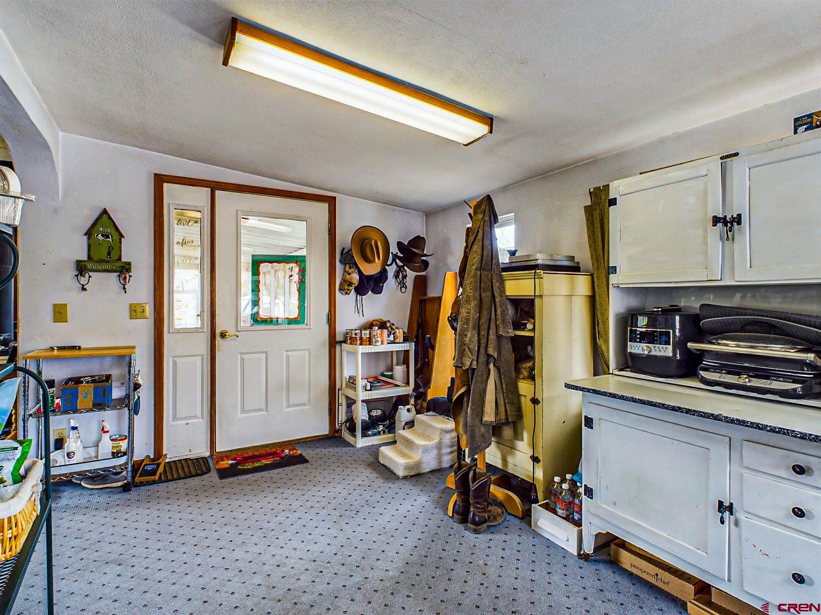 18236 Kiser Creek Road Cedaredge, CO 81413 - Photo 7 of 35 a view of a room with gym equipment