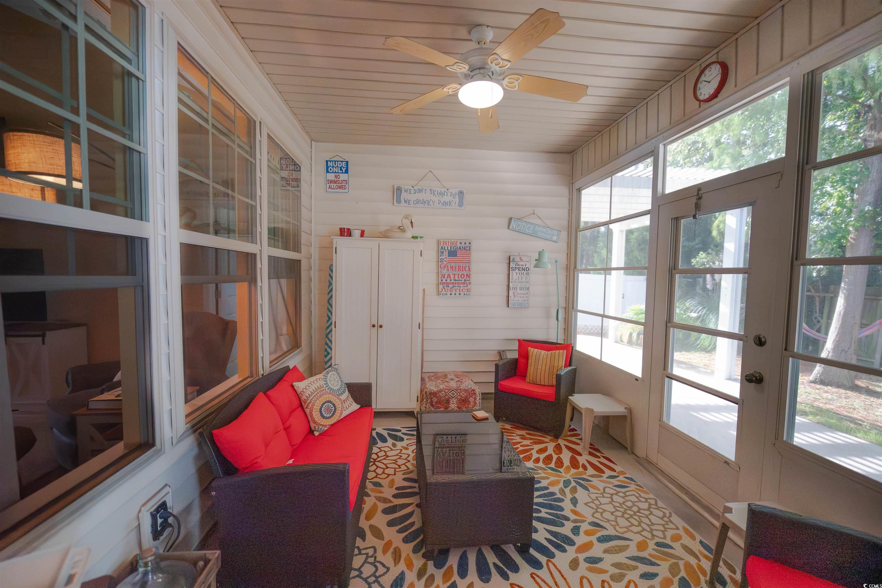 209 Golden Oaks Drive Murrells Inlet, SC 29576 - Photo 31 of 40 Sunroom with ceiling fan