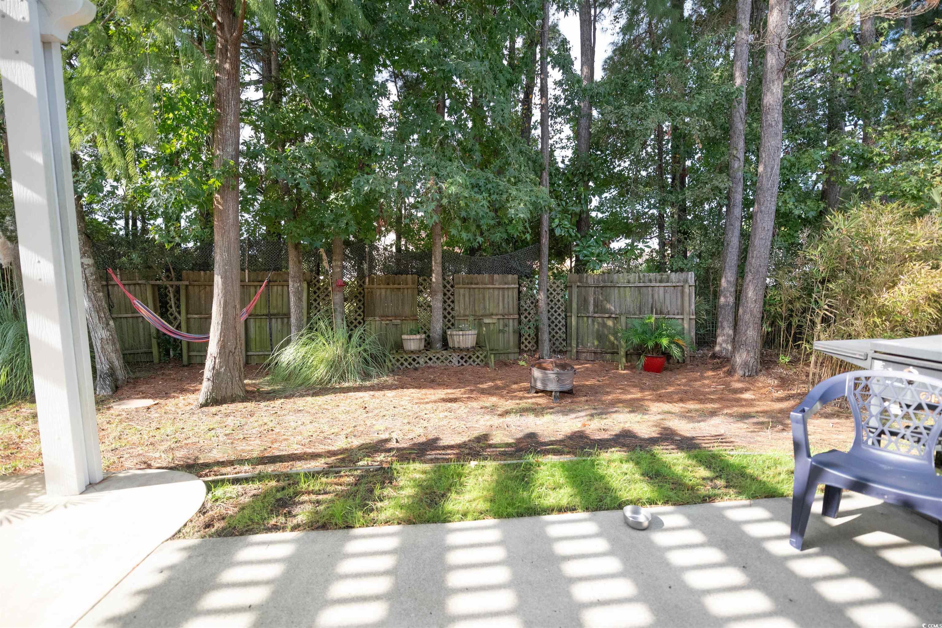 209 Golden Oaks Drive Murrells Inlet, SC 29576 - Photo 35 of 40 Fenced backyard featuring a patio