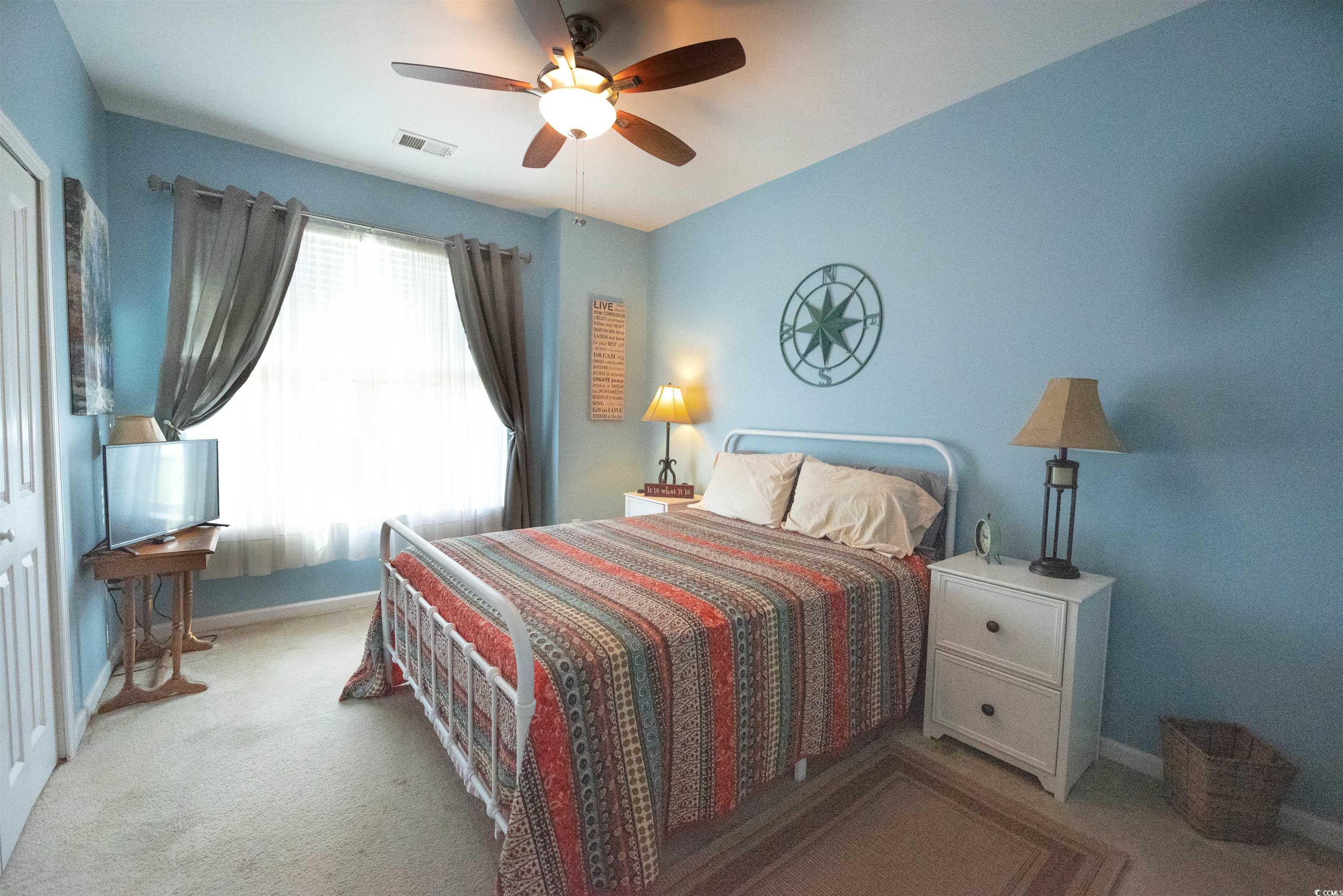 209 Golden Oaks Drive Murrells Inlet, SC 29576 - Photo 4 of 40 Bedroom with carpet flooring and a ceiling fan