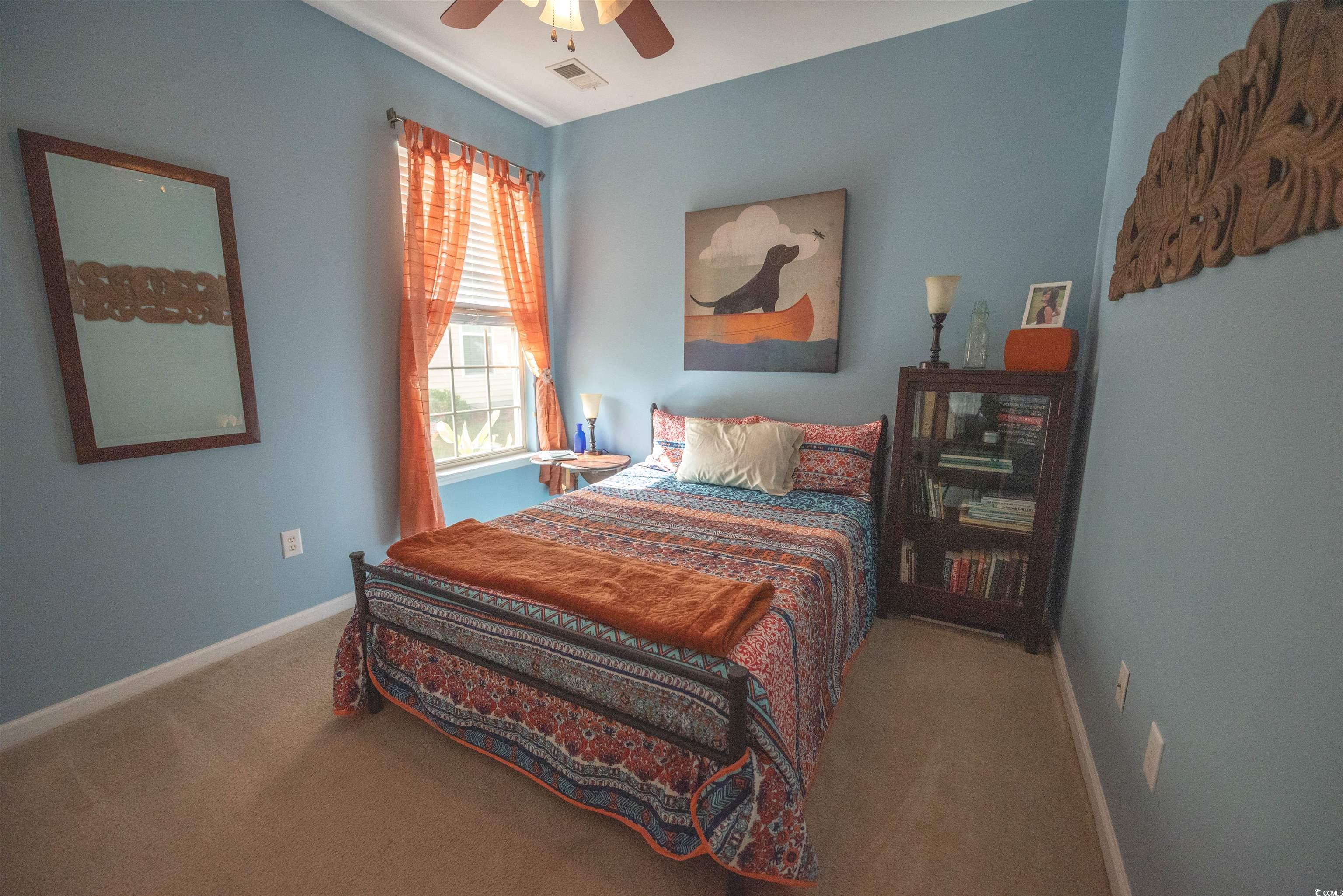 209 Golden Oaks Drive Murrells Inlet, SC 29576 - Photo 6 of 40 Carpeted bedroom with baseboards and ceiling fan