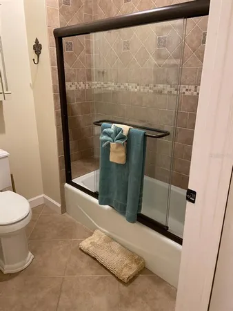 a bathroom with a sink and toilet
