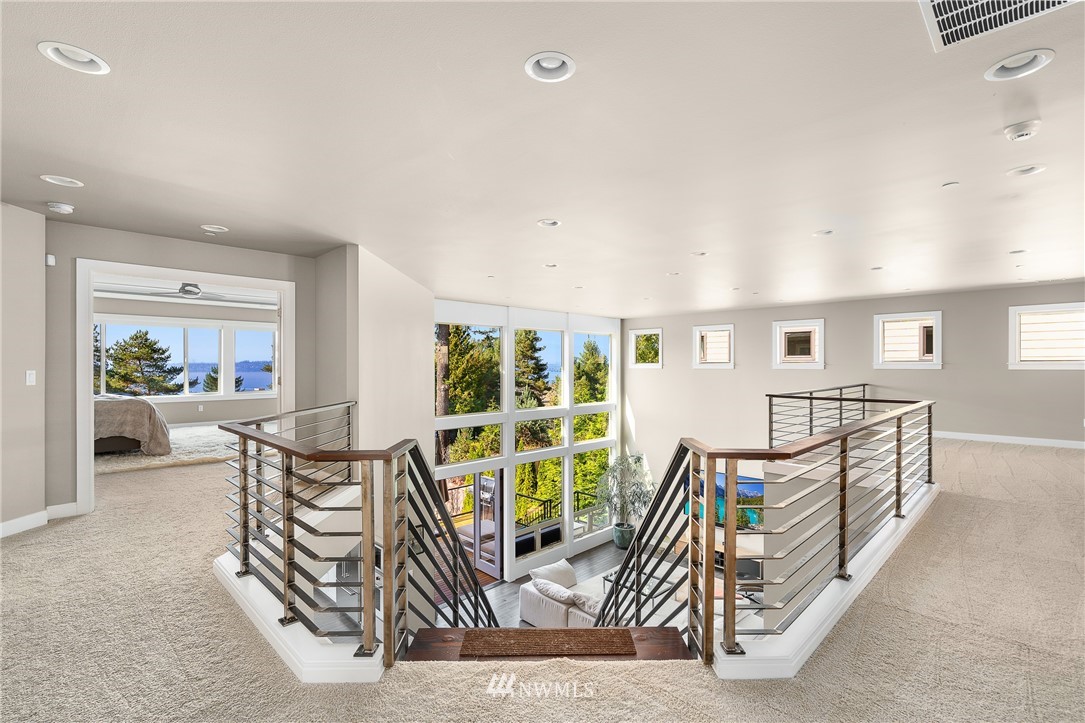 10406 Northeast 52nd Street Kirkland, WA 98033 - Photo 15 of 36 a view of a livingroom with furniture and floor to ceiling window