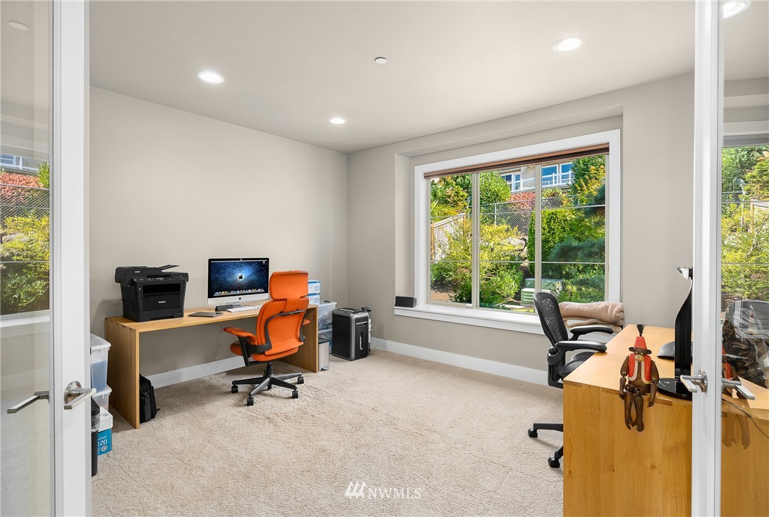 10406 Northeast 52nd Street Kirkland, WA 98033 - Photo 21 of 36 a view of a workspace with furniture and a window