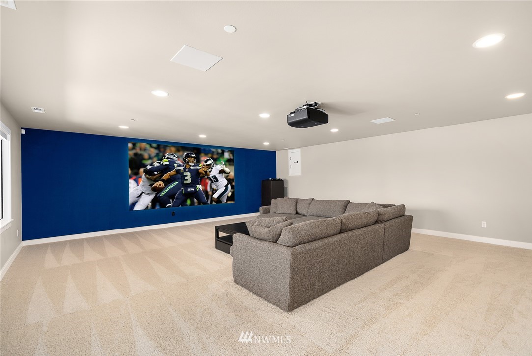 10406 Northeast 52nd Street Kirkland, WA 98033 - Photo 29 of 36 a living room with furniture and wall painting