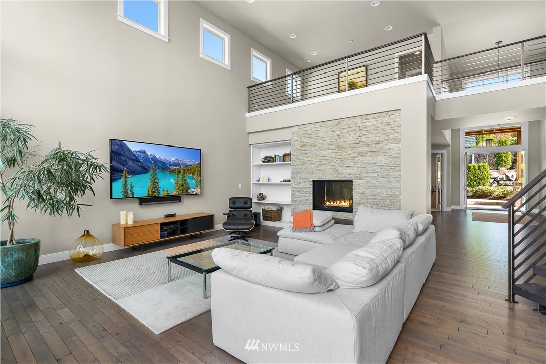 10406 Northeast 52nd Street Kirkland, WA 98033 - Photo 6 of 36 a living room with furniture and a flat screen tv