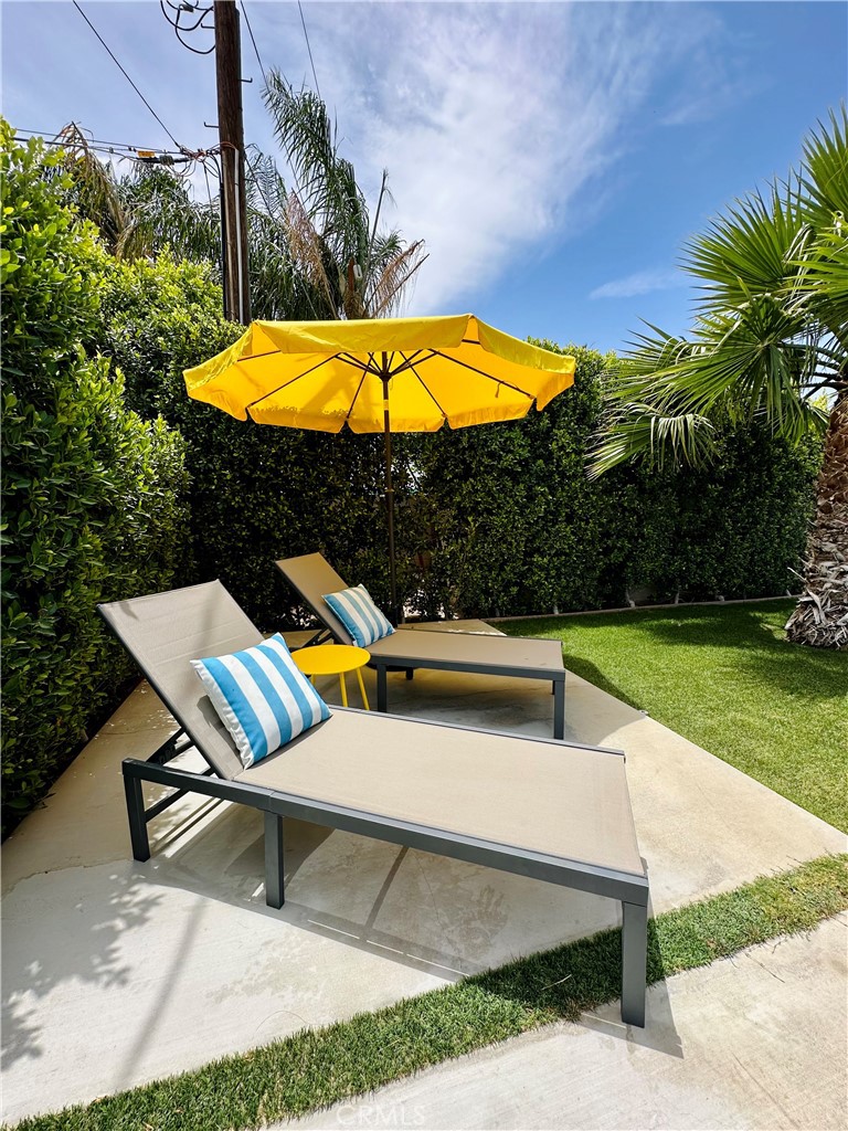 68315 Modalo Road Cathedral City, CA 92234 - Photo 16 of 18 a view of outdoor space yard swimming pool and patio