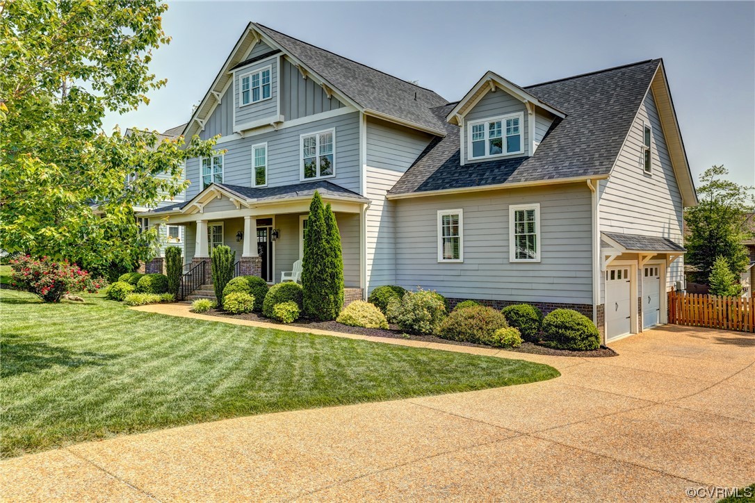 2007 Colwyn Bay Drive Midlothian, VA 23112 - Photo 2 of 49 a front view of a house with a yard