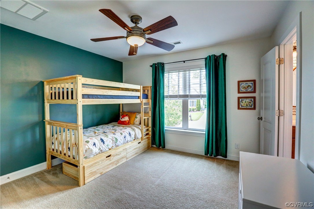 2007 Colwyn Bay Drive Midlothian, VA 23112 - Photo 36 of 49 a bedroom with a bed and a large window