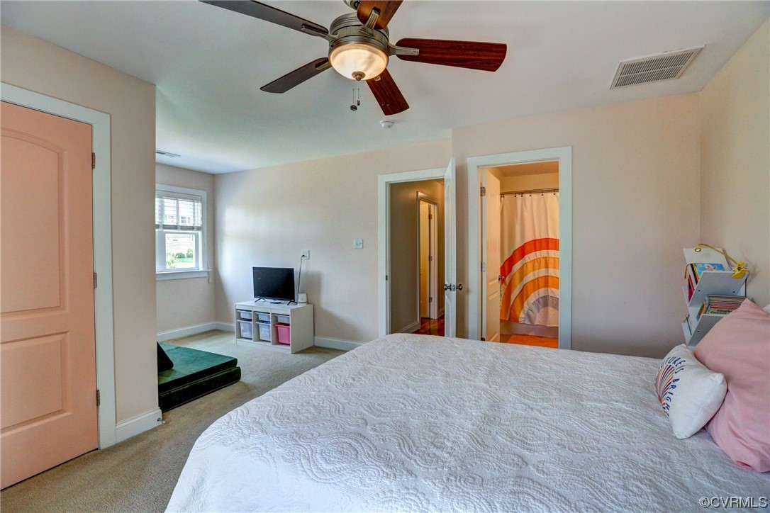 2007 Colwyn Bay Drive Midlothian, VA 23112 - Photo 37 of 49 a bedroom with a bed and a flat screen tv