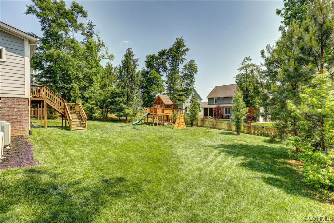 2007 Colwyn Bay Drive Midlothian, VA 23112 - Photo 43 of 49 a view of a house with a backyard