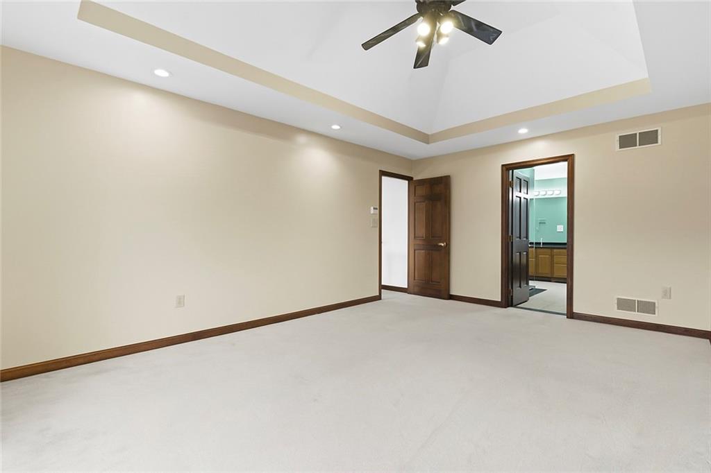 370 Cobblestone Circle McKees Rocks, PA 15136 - Photo 23 of 50 an empty room with chandelier fan