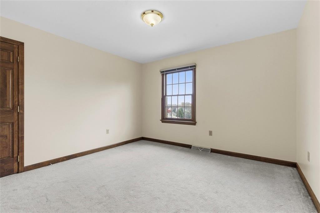 370 Cobblestone Circle McKees Rocks, PA 15136 - Photo 28 of 50 an empty room with windows