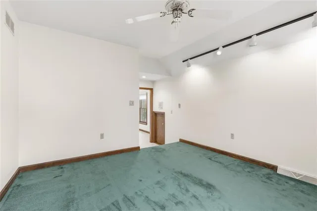 a view of a room with an empty space