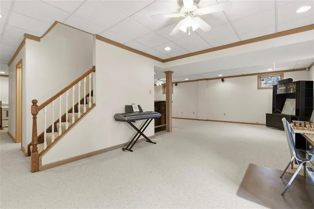 a view of entryway with wooden stairs