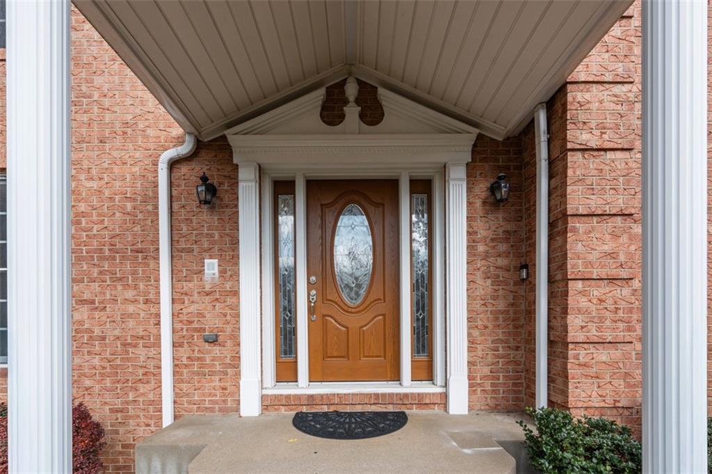 370 Cobblestone Circle McKees Rocks, PA 15136 - Photo 4 of 50 a front view of a house with garden