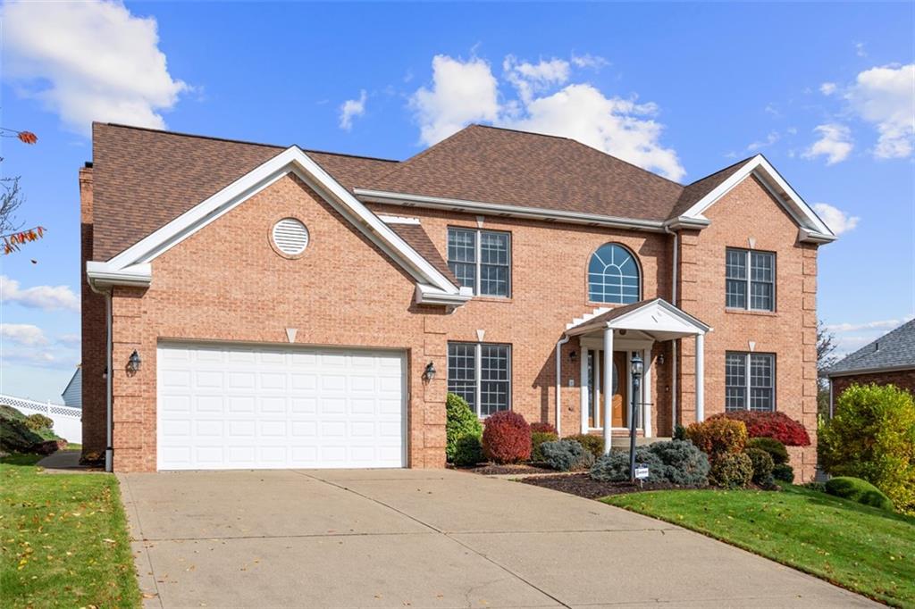 370 Cobblestone Circle McKees Rocks, PA 15136 - Photo 50 of 50 a front view of a house with a yard