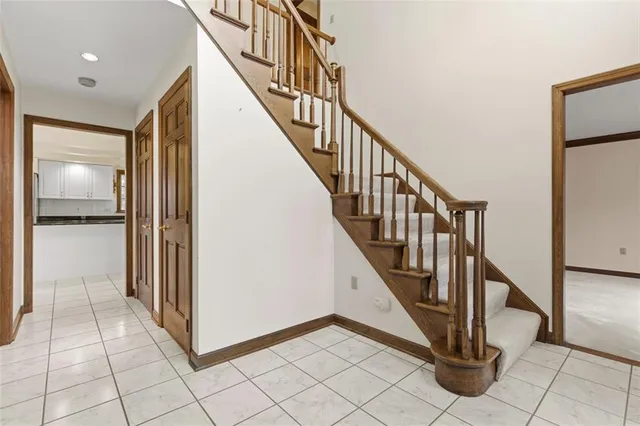 a view of an entryway with staircase